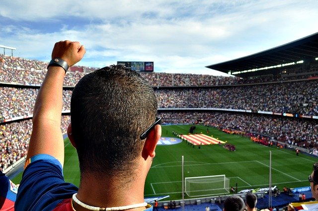 Man watching Barcelona FC's match in Nou Camp